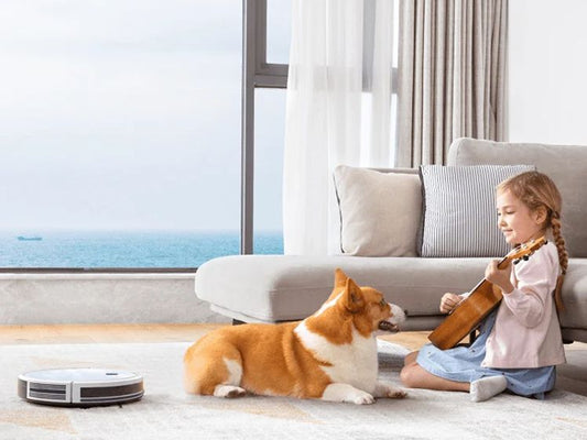 Robotstofzuiger met hond en kind
